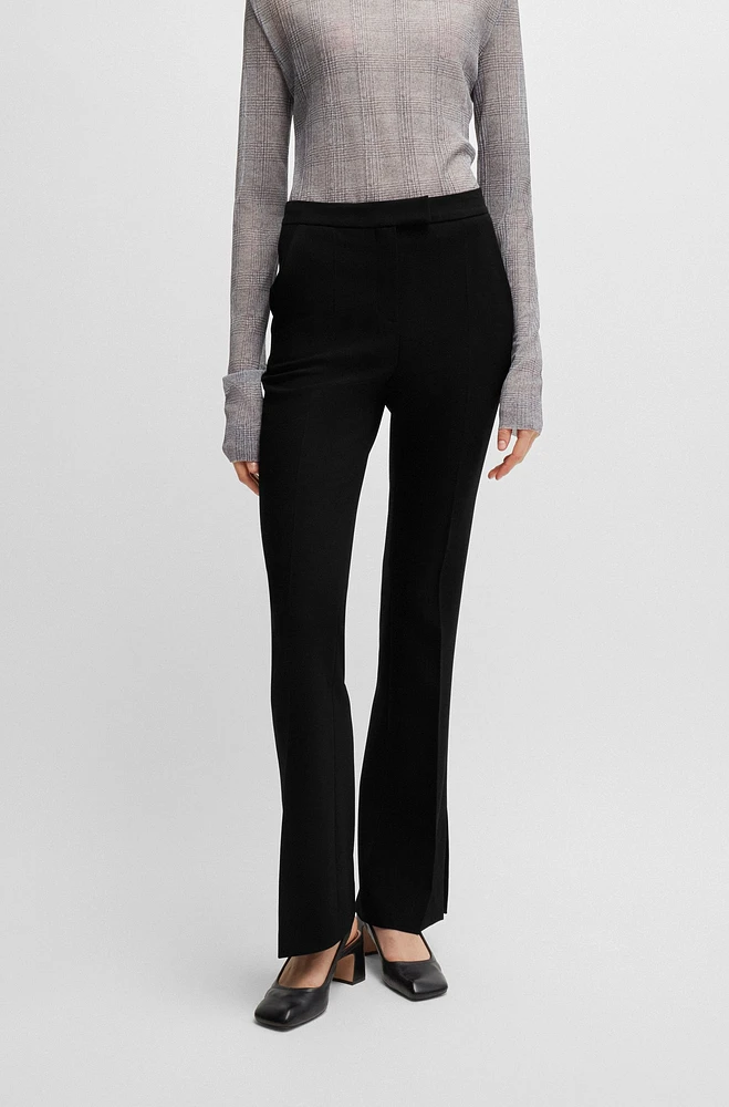 High-waisted slim-fit trousers with flared leg