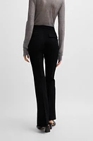 High-waisted slim-fit trousers with flared leg