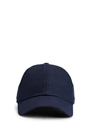 Wool cap with faux-leather logo label