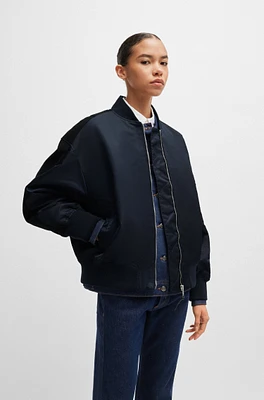 Water-repellent bomber jacket with zipped sleeve pocket