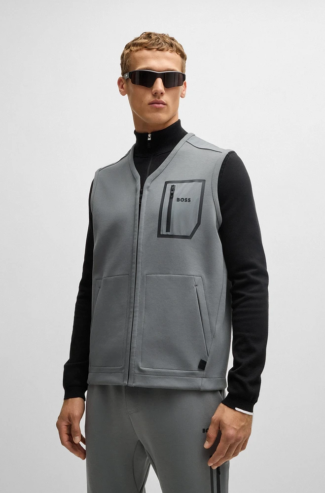 Gilet with decorative reflective logo