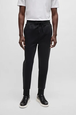 Tracksuit bottoms with contrast insert