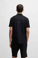 Mixed-material polo shirt with decorative reflective logo