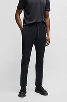 Regular-fit tracksuit bottoms with quick-dry performance