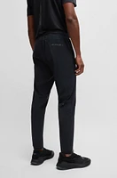 Regular-fit tracksuit bottoms with quick-dry performance