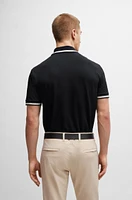 Polo shirt with stripes and logo