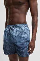 Quick-dry swim shorts with seasonal print