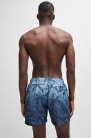 Quick-dry swim shorts with seasonal print