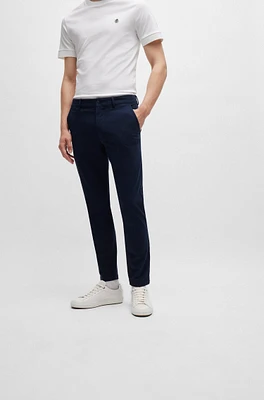 Pantalones slim fit de algodón estructurado