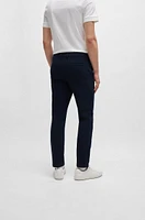 Pantalones slim fit de algodón estructurado