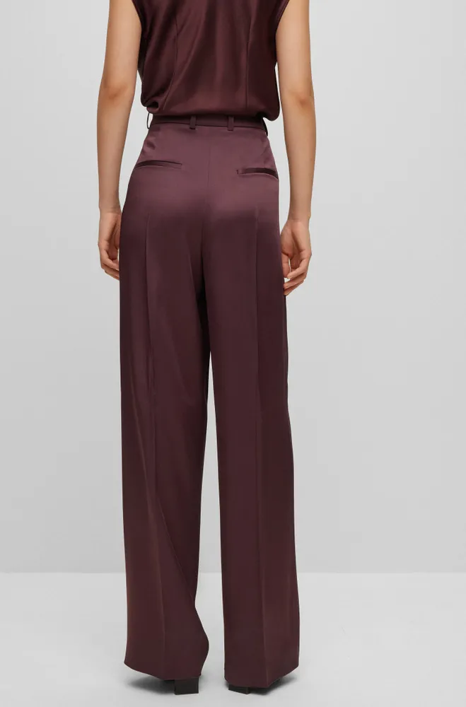 Pantalones de traje relaxed fit con pernera ancha