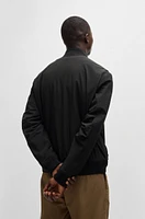 Water-repellent jacket with zipped sleeve pocket