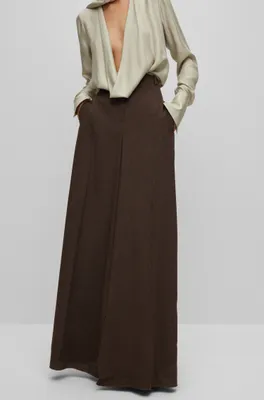 Relaxed-fit, wide-leg wool trousers with skirt effect