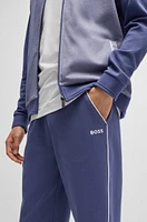 Tracksuit bottoms with contrast piping