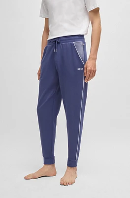 Tracksuit bottoms with contrast piping