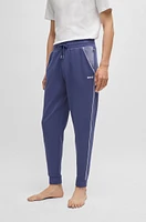 Tracksuit bottoms with contrast piping