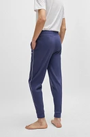 Tracksuit bottoms with contrast piping