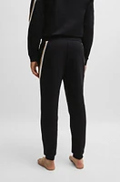 Cotton-terry tracksuit bottoms with signature-stripe tape