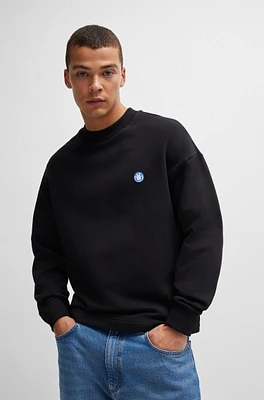 Cotton-terry sweatshirt with smiley-face logo patch
