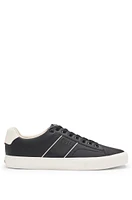 Faux-leather trainers with plain and grained textures