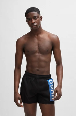 Partially lined quick-dry swim shorts with vertical logo