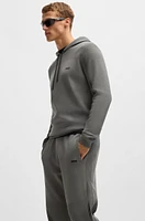 Regular-fit knitted tracksuit bottoms with stripes and branding