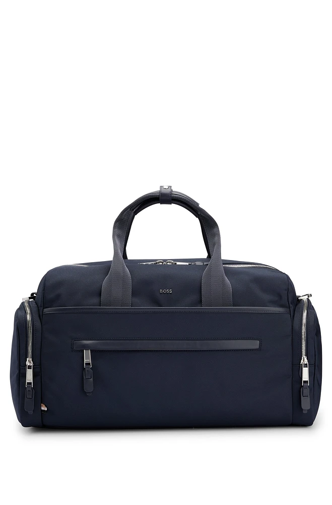 BOSS - Logo-trimmed holdall in structured nylon with smart sleeve - Dark Blue