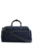 BOSS - Logo-trimmed holdall in structured nylon with smart sleeve - Dark Blue