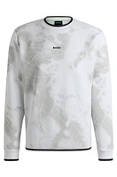 Sweatshirt with decorative reflective artwork