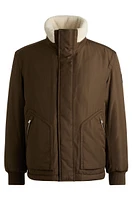 Water-repellent jacket with faux-fur collar