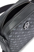 Monogram-pattern reporter bag with signature hardware