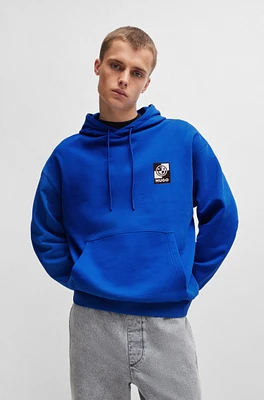 Cotton-terry hoodie with graphic logo artwork