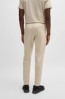 Tracksuit bottoms with tape inserts