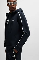 Zip-up hoodie with tape inserts