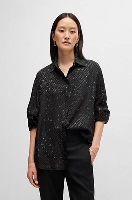 Loose-fit blouse with print and dot jacquard