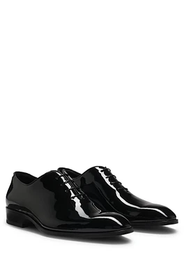 Patent-leather Oxford shoes with collar piping