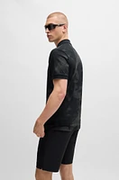 Polo shirt with decorative reflective print