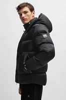 Water-repellent puffer jacket with micro monograms