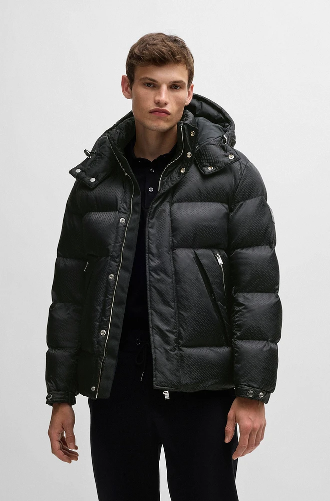 Water-repellent puffer jacket with micro monograms