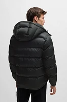 Water-repellent puffer jacket with micro monograms