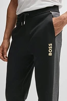 Tracksuit bottoms with foil-print logo