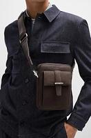 Leather reporter bag with branded trims