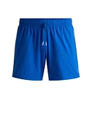 Fully lined swim shorts with signature stripe