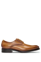 Burnished-leather Derby shoes with piped details