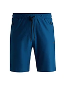 Active-stretch shorts with decorative reflective details