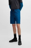 Active-stretch shorts with decorative reflective details