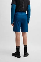 Active-stretch shorts with decorative reflective details