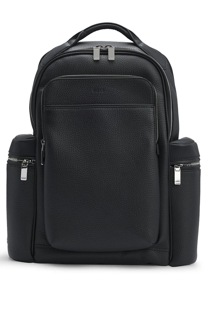 Multi-pocket backpack in Italian leather with signature trims