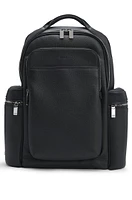 Multi-pocket backpack in Italian leather with signature trims