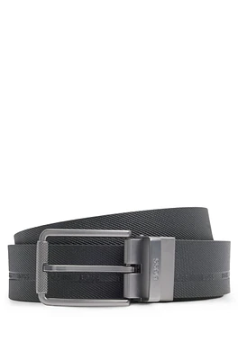 Reversible Italian leather belt in printed and coated finishes 